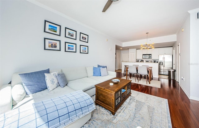 700 S Harbour Island Blvd Unit 404, Tampa, FL 33602 - living area with baseboards, ceiling fan with notable chandelier, dark wood finished floors, and ornamental molding