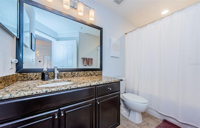 700 S Harbour Island Blvd Unit 404, Tampa, FL 33602 - bathroom with tile patterned floors, visible vents, toilet, and vanity