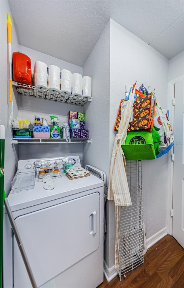700 S Harbour Island Blvd Unit 404, Tampa, FL 33602 - washroom featuring baseboards, a textured ceiling, wood finished floors, and laundry area