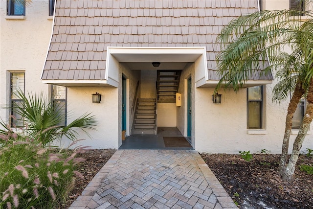 720 Lyndhurst St Unit 1121, Dunedin, FL 34698 - property entrance featuring stucco siding