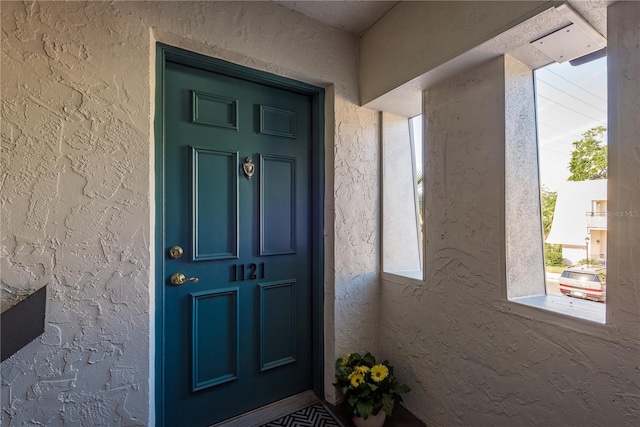 720 Lyndhurst St Unit 1121, Dunedin, FL 34698 - entrance to property with stucco siding