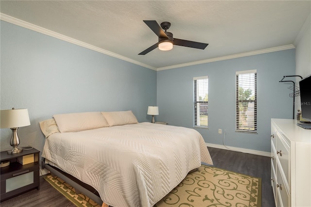 720 Lyndhurst St Unit 1121, Dunedin, FL 34698 - bedroom with dark wood-type flooring, ornamental molding, baseboards, and a ceiling fan