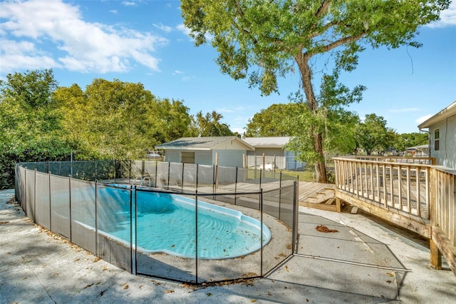 7323 Andre Dr, Zephyrhills, FL 33541 - view of pool featuring a patio area, a deck, fence, and a fenced in pool