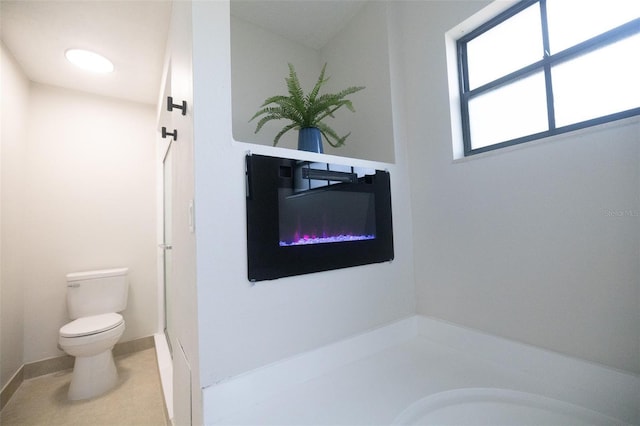 2715 Willow Oaks Dr, Valrico, FL 33594 - bathroom featuring toilet and tile patterned flooring