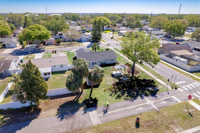 birds eye view of property with a residential view