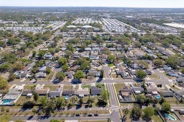 birds eye view of property with a residential view