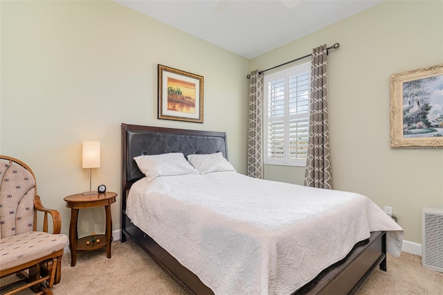 689 Chipper Dr, Sun City Center, FL 33573 - bedroom featuring baseboards, carpet, and ceiling fan
