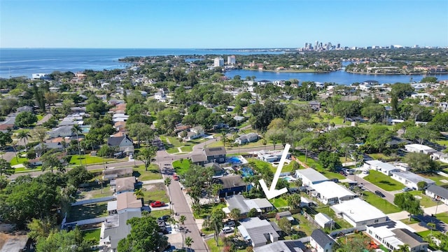 birds eye view of property featuring a water view