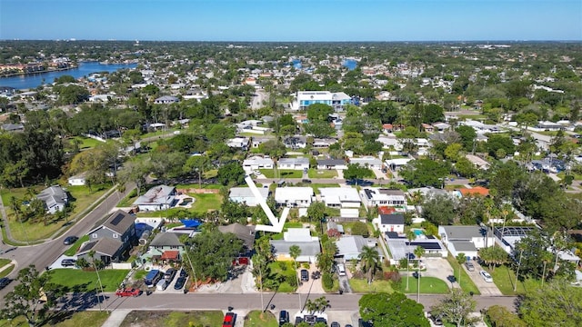 bird's eye view with a residential view and a water view