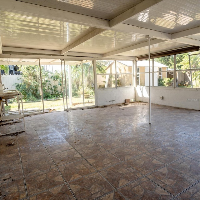view of unfurnished sunroom