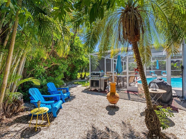 13420 Rustic Pines Blvd S, Seminole, FL 33776 - view of yard with an outdoor pool, a lanai, and a patio