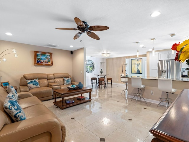 13420 Rustic Pines Blvd S, Seminole, FL 33776 - living room featuring ceiling fan, baseboards, recessed lighting, and light tile patterned floors