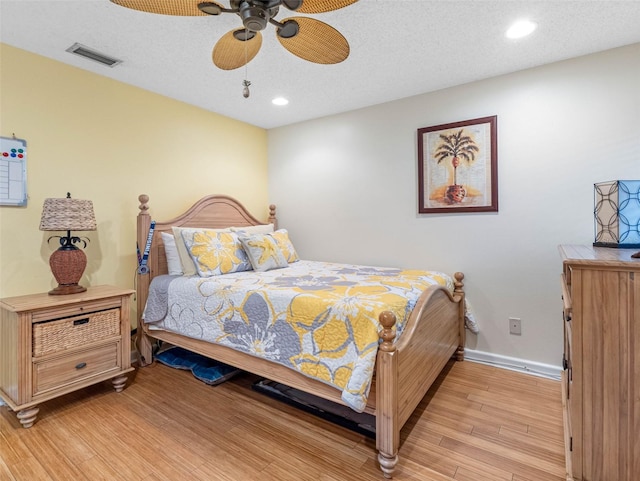 13420 Rustic Pines Blvd S, Seminole, FL 33776 - bedroom with light wood-style flooring, baseboards, recessed lighting, and a ceiling fan