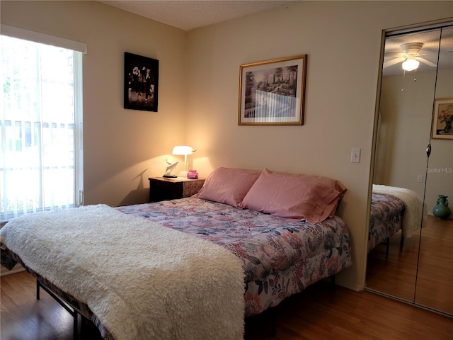7392 Meadow Brook Ln, Spring Hill, FL 34606 - bedroom with wood finished floors and a closet