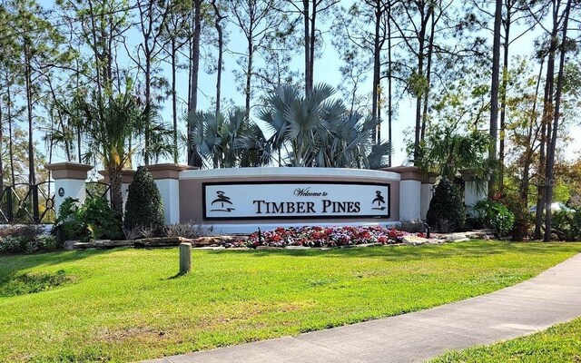 7392 Meadow Brook Ln, Spring Hill, FL 34606 - community sign with a lawn