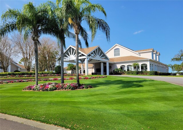 7392 Meadow Brook Ln, Spring Hill, FL 34606 - surrounding community with a lawn
