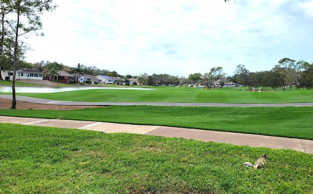 7392 Meadow Brook Ln, Spring Hill, FL 34606 - view of home's community featuring a yard, golf course view, and a residential view