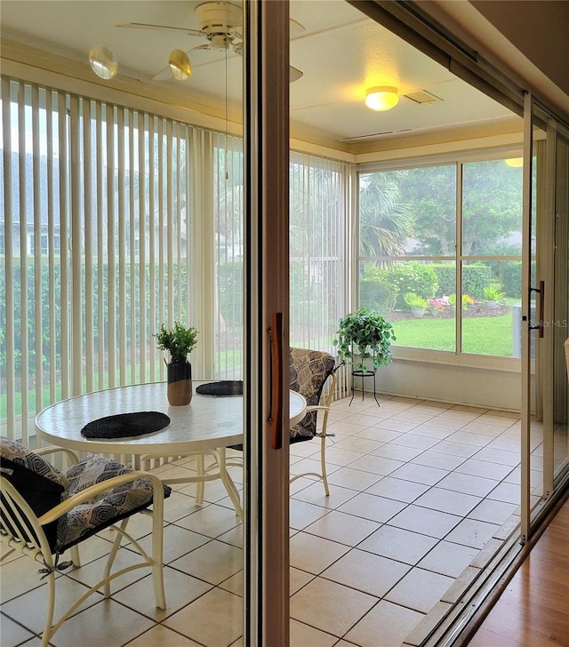 7392 Meadow Brook Ln, Spring Hill, FL 34606 - sunroom / solarium featuring tile patterned flooring