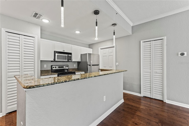 700 S Harbour Island Blvd Unit 240, Tampa, FL 33602 - kitchen featuring visible vents, dark wood finished floors, dark stone counters, stainless steel appliances, and white cabinetry