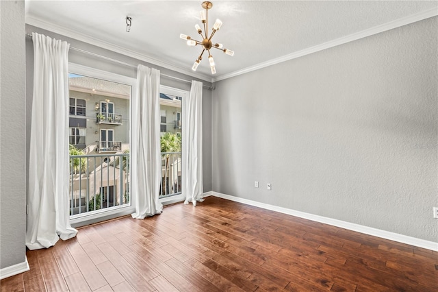 700 S Harbour Island Blvd Unit 240, Tampa, FL 33602 - spare room featuring a notable chandelier, ornamental molding, baseboards, and wood finished floors