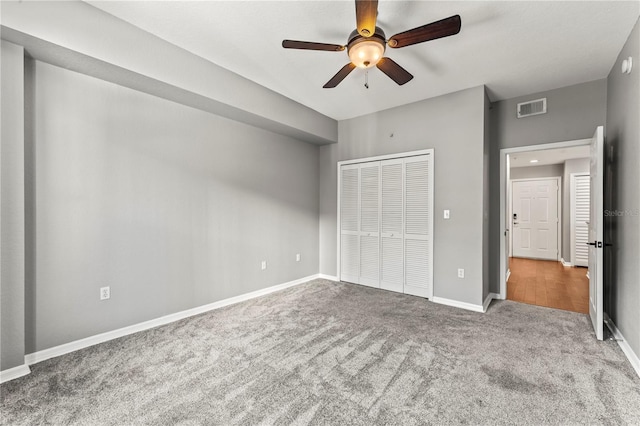 700 S Harbour Island Blvd Unit 240, Tampa, FL 33602 - unfurnished bedroom with visible vents, a ceiling fan, a closet, carpet floors, and baseboards