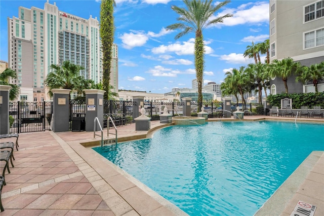 700 S Harbour Island Blvd Unit 240, Tampa, FL 33602 - community pool with a patio area, a view of city, and fence