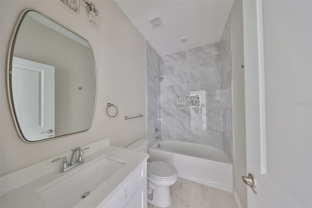 full bathroom featuring shower / tub combination, visible vents, toilet, and vanity