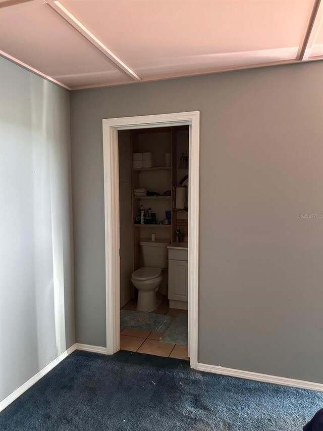5562 S US-301, Bushnell, FL 33513 - bathroom featuring toilet and baseboards