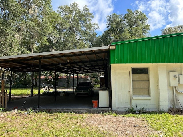 5562 S US-301, Bushnell, FL 33513 - view of outbuilding featuring an attached carport and driveway