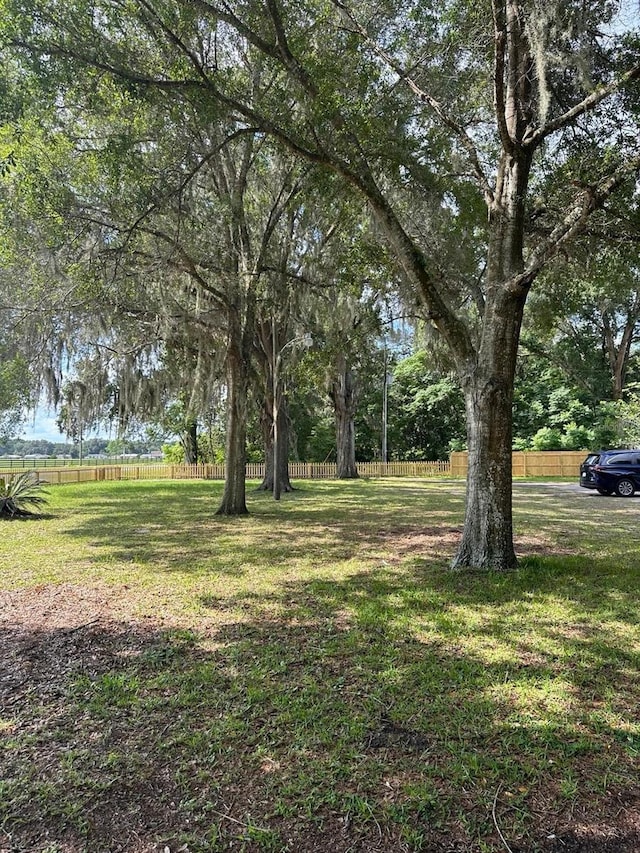 5562 S US-301, Bushnell, FL 33513 - view of yard featuring fence