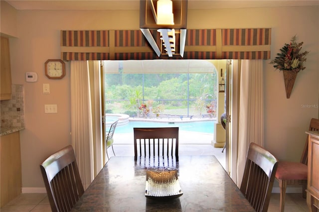 dining room featuring light tile patterned floors