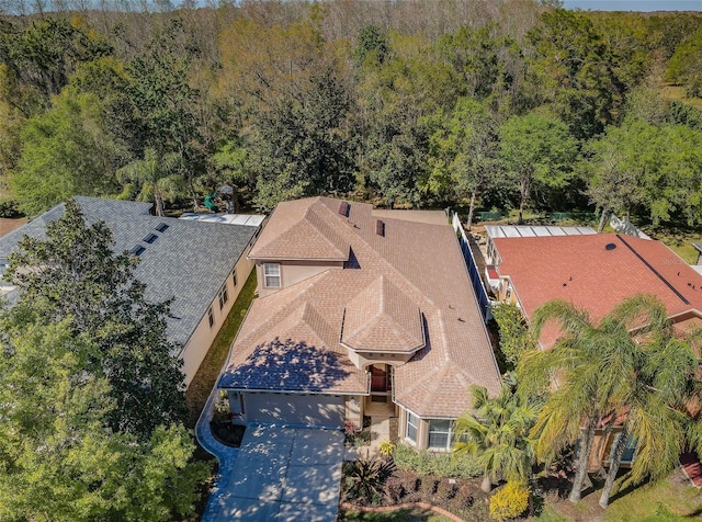 15925 Pond Rush Ct, Land O Lakes, FL 34638 - view of subject property with a heavily wooded area