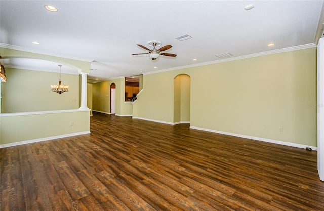 15925 Pond Rush Ct, Land O Lakes, FL 34638 - empty room featuring arched walkways, ceiling fan, ornamental molding, dark wood-style flooring, and recessed lighting