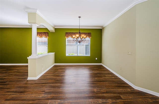 15925 Pond Rush Ct, Land O Lakes, FL 34638 - unfurnished dining area featuring ornate columns, a chandelier, crown molding, and wood finished floors