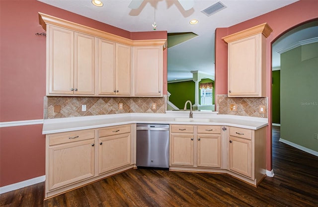 15925 Pond Rush Ct, Land O Lakes, FL 34638 - kitchen with dishwasher, dark wood finished floors, ceiling fan, light countertops, and arched walkways