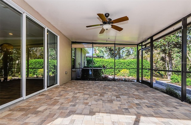 15925 Pond Rush Ct, Land O Lakes, FL 34638 - unfurnished sunroom with a ceiling fan