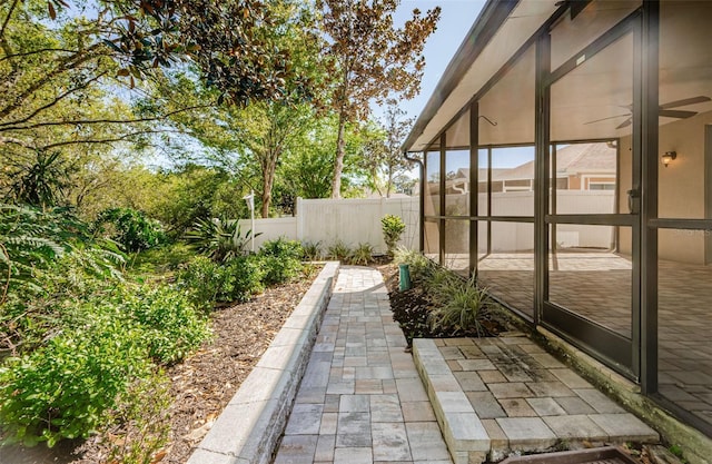 15925 Pond Rush Ct, Land O Lakes, FL 34638 - view of patio with a sunroom