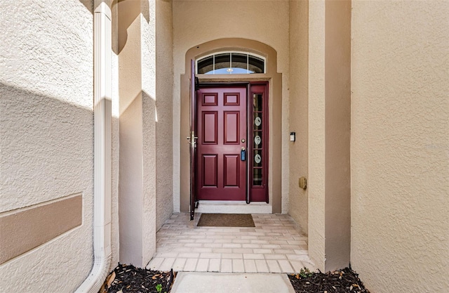 15925 Pond Rush Ct, Land O Lakes, FL 34638 - property entrance featuring stucco siding