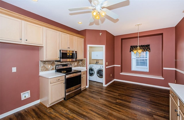 15925 Pond Rush Ct, Land O Lakes, FL 34638 - kitchen with appliances with stainless steel finishes, washer and clothes dryer, light countertops, backsplash, and dark wood finished floors