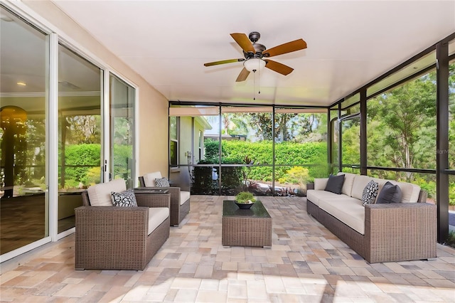 15925 Pond Rush Ct, Land O Lakes, FL 34638 - sunroom with a ceiling fan, an outdoor hangout area, and healthy amount of natural light