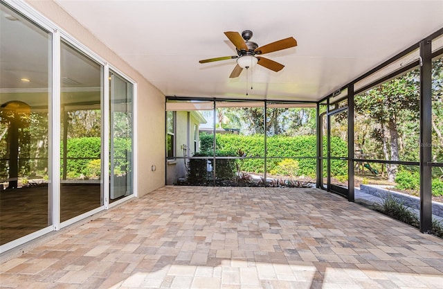 15925 Pond Rush Ct, Land O Lakes, FL 34638 - unfurnished sunroom featuring ceiling fan