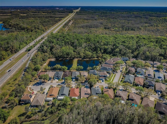 15925 Pond Rush Ct, Land O Lakes, FL 34638 - aerial view of property's location with nearby suburban area and a nearby body of water