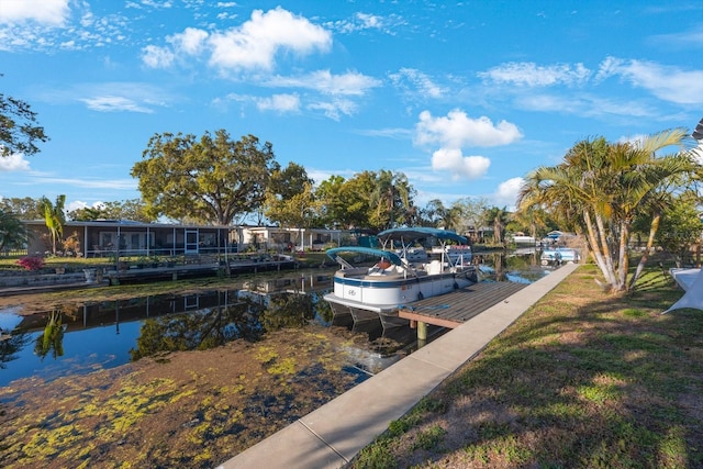 dock area featuring a water view