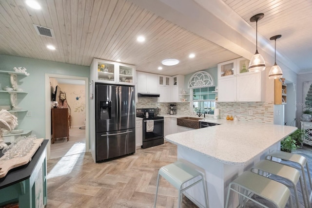 kitchen with visible vents, a peninsula, black electric range oven, stainless steel refrigerator with ice dispenser, and wood ceiling