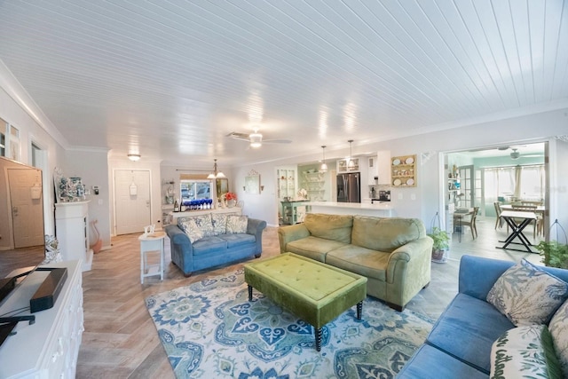 living area featuring crown molding, ceiling fan, and wooden ceiling