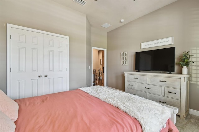 bedroom featuring light colored carpet, visible vents, a closet, and baseboards