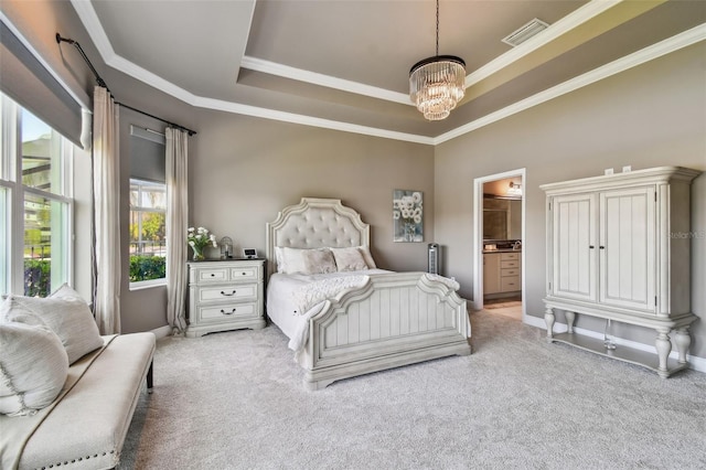 carpeted bedroom with a chandelier, visible vents, a raised ceiling, and ornamental molding