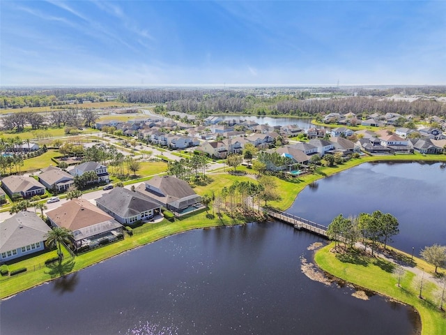 aerial view featuring a residential view and a water view