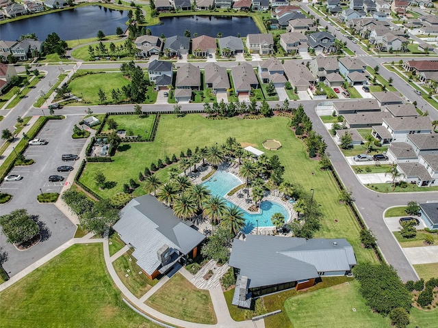 aerial view with a residential view and a water view