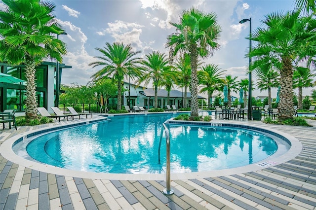 pool with a patio area